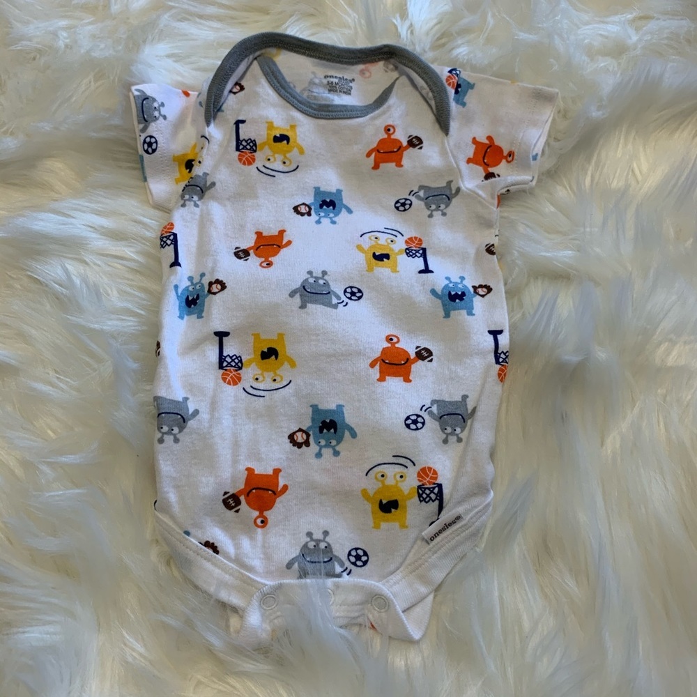 Size 3-6 mos sports onesie C1